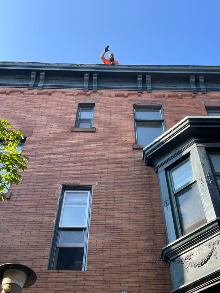 GEN3 Tech on roof Looking for Crane.