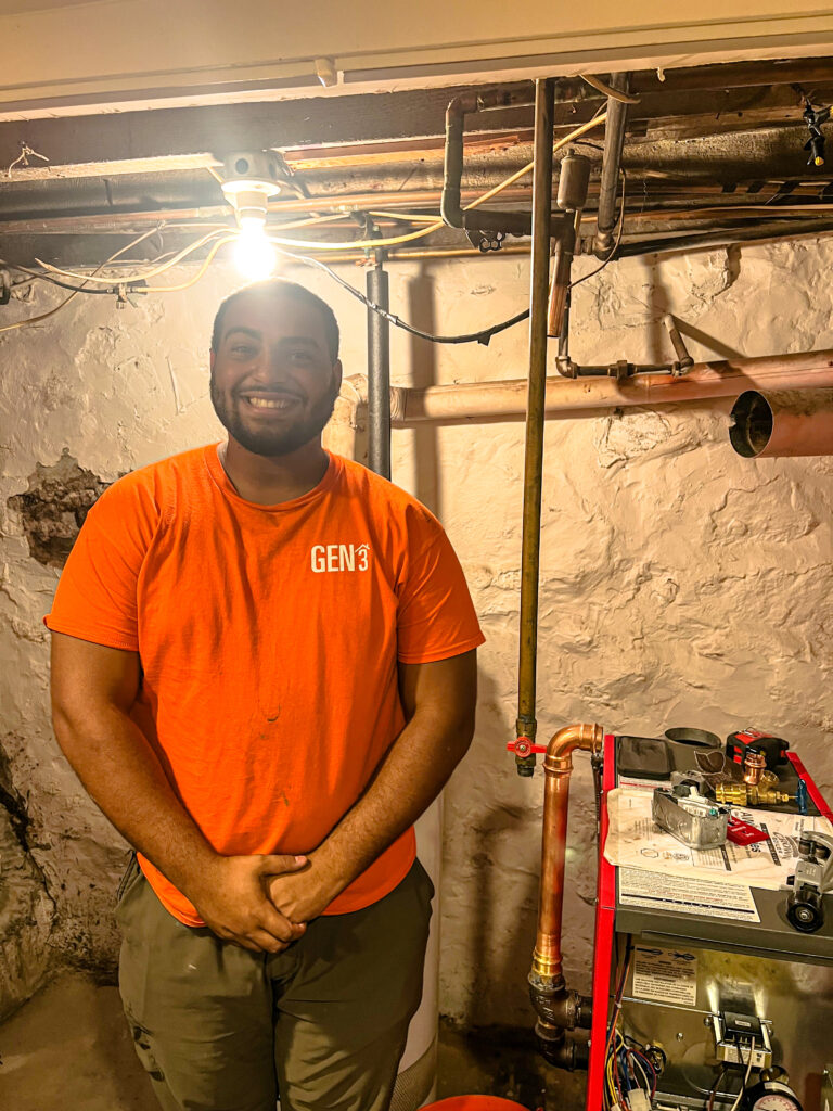 GEN3 Electric & HVAC technician Frank completing a Philadelphia boiler installation with new copper piping and heating system upgrades.