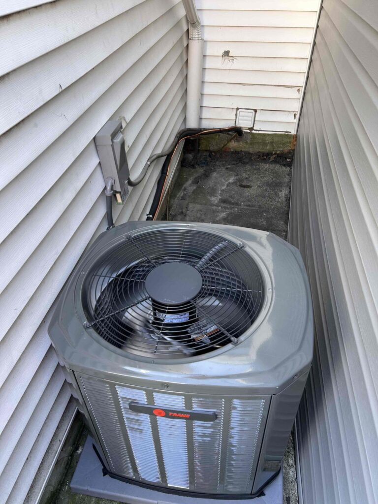 “Tight space HVAC installation outdoor condenser after